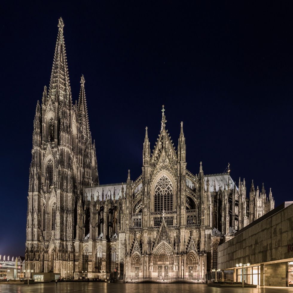 low angle view of cologne cathedral against clear sky at night