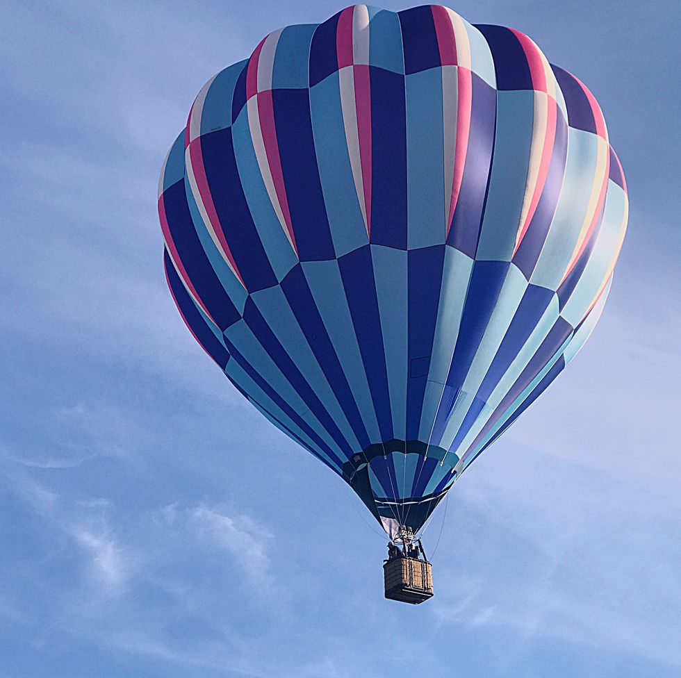 low angle view of hot air balloon against blue sky