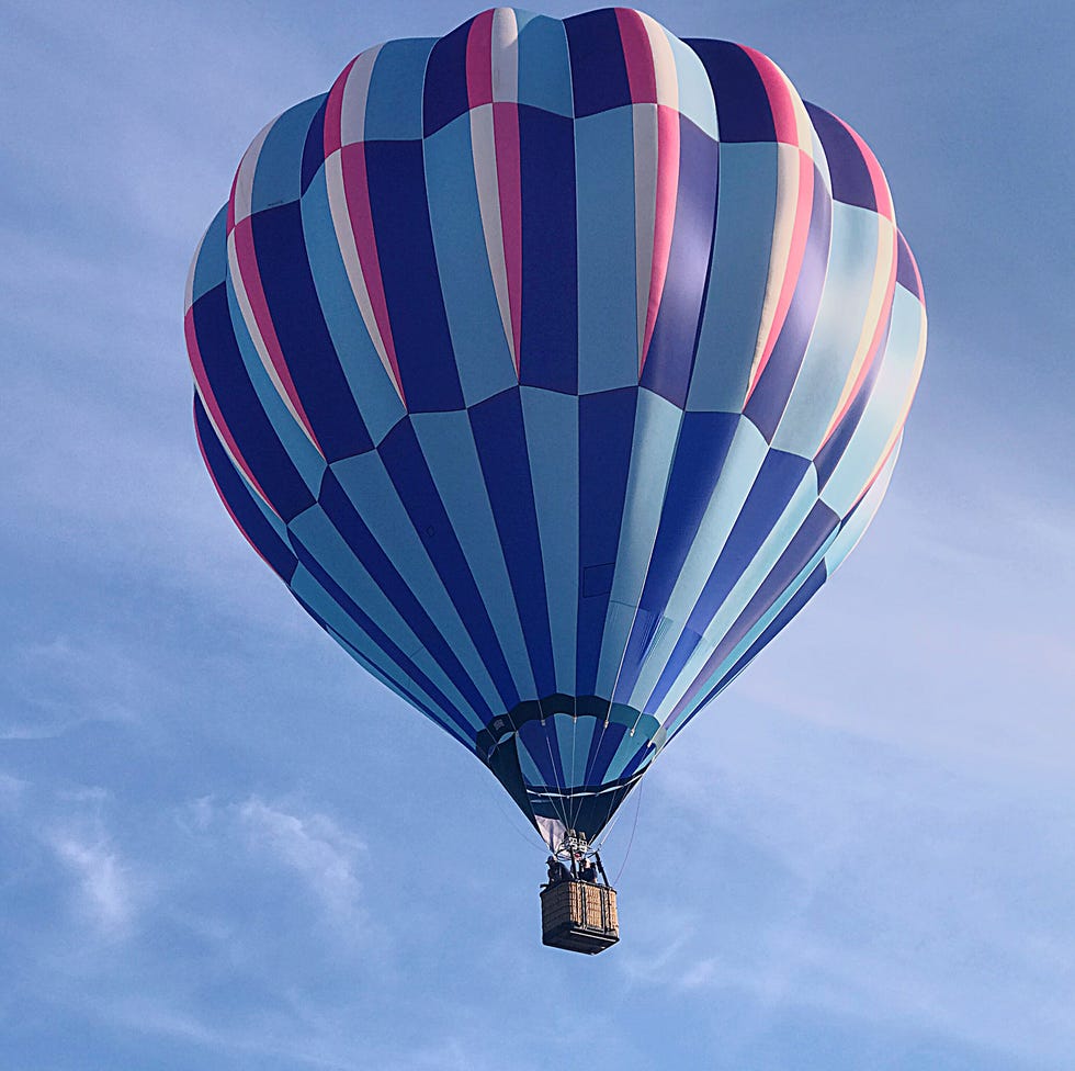 low angle view of hot air balloon against blue sky