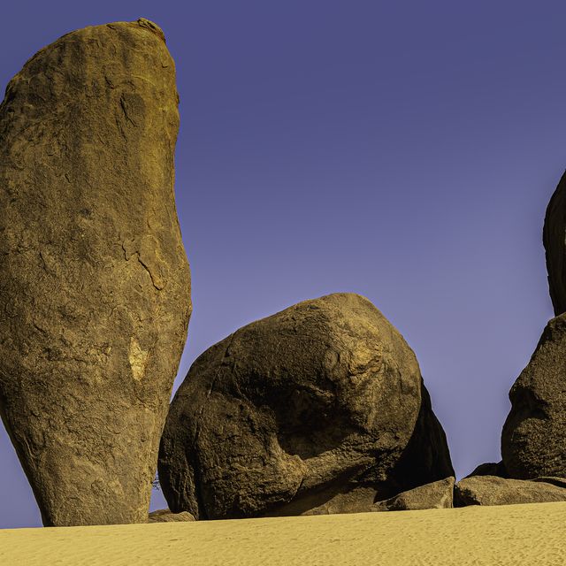 low angle view of rock formation against clear blue sky,saudi arabia
