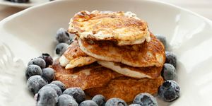 low carb keto diet pancakes from almond coconut flour with blueberries on white plate
