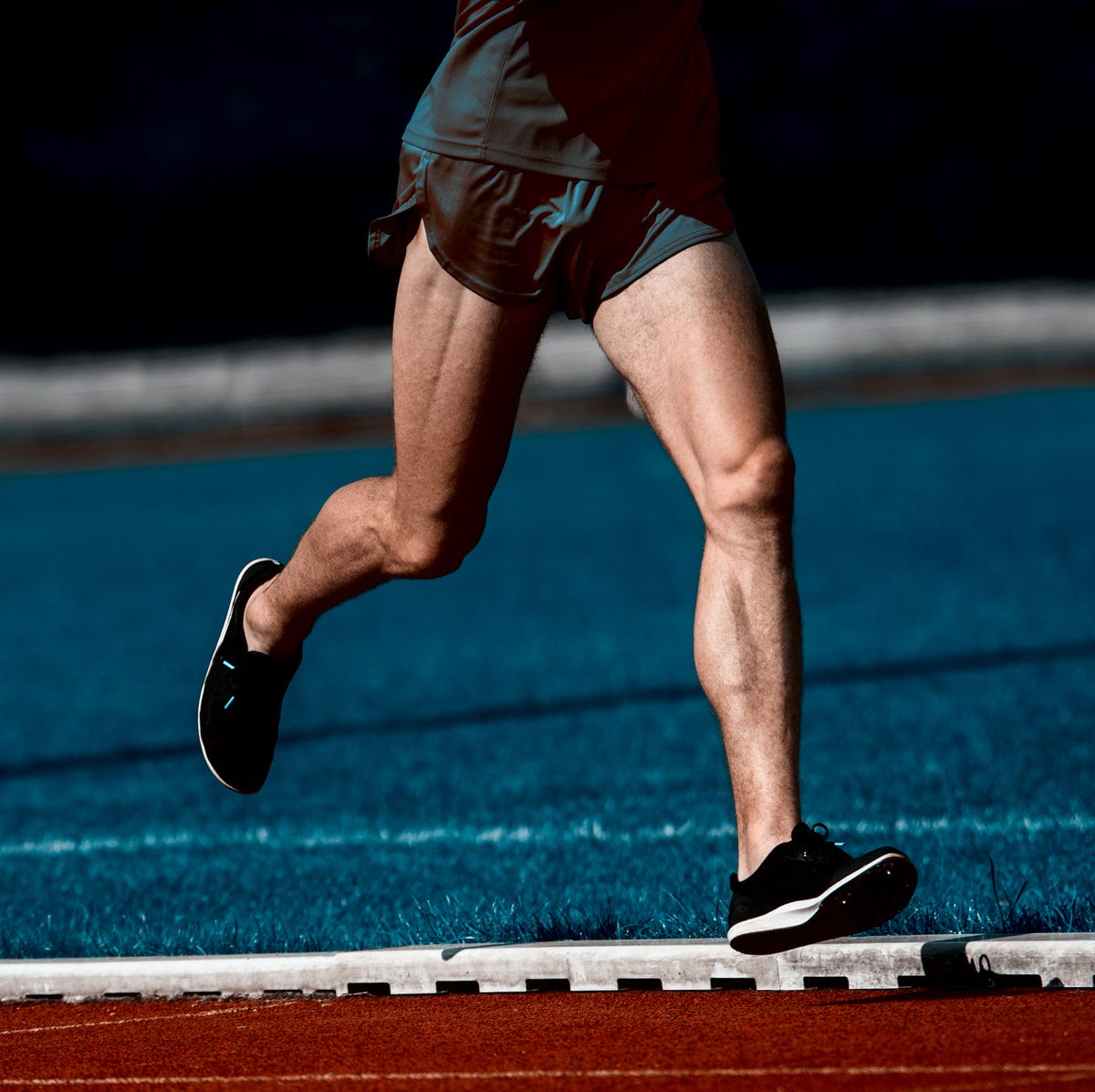 low section of man running marathon, does muscle weigh more than fat