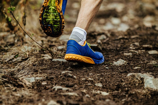 low section of man running on land