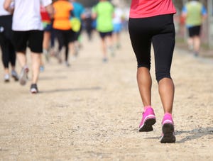 Low Section Of People Running On Road