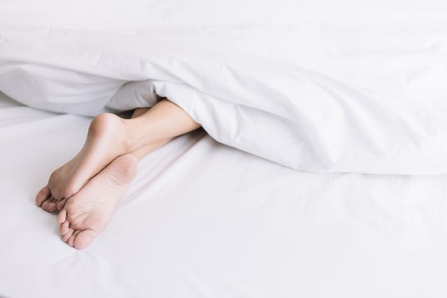 person sleeping on bed