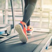12 3 30 workout low section of woman running on treadmill in gym