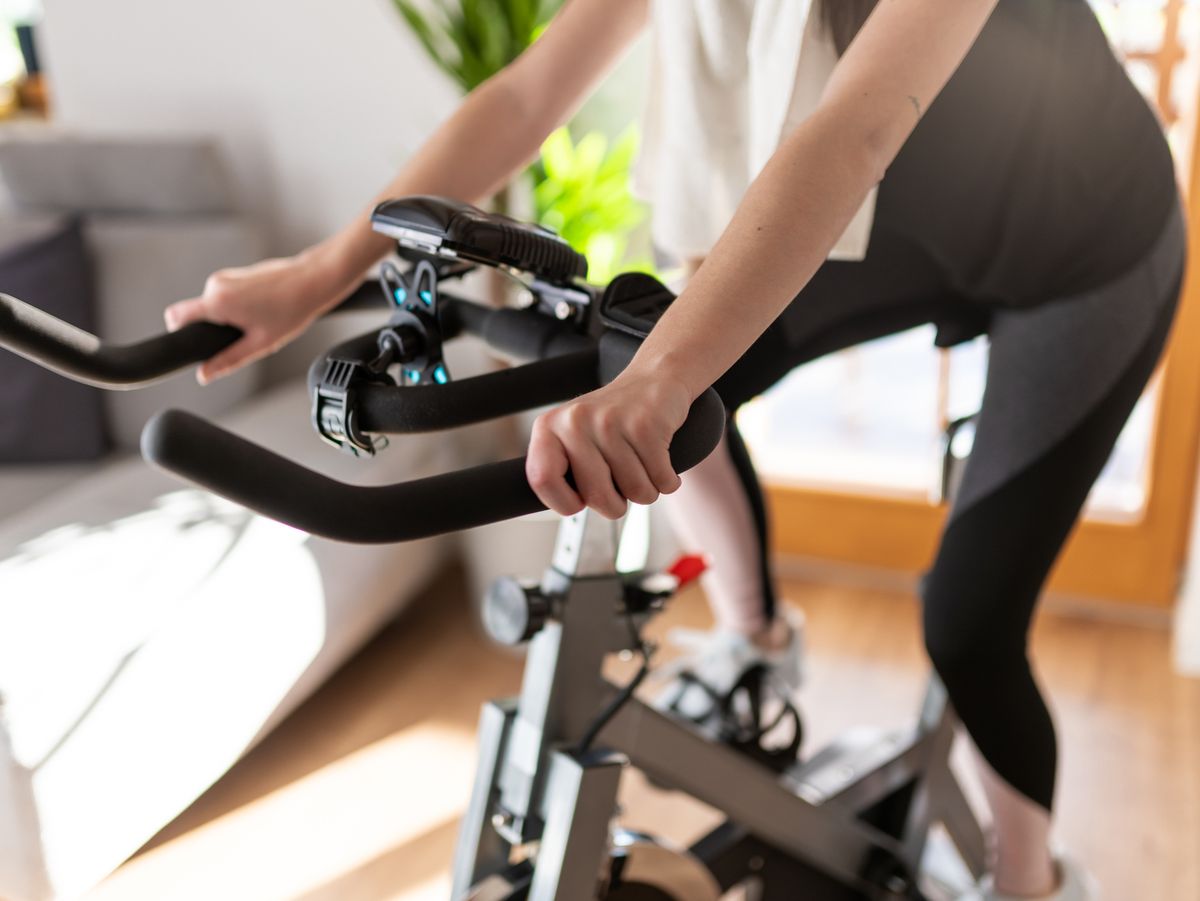 Here's a 45-Minute Indoor Cycling Workout and Playlist to Build