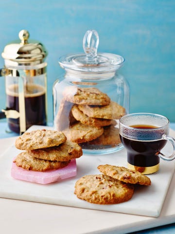 a plate of cookies and a cup of coffee