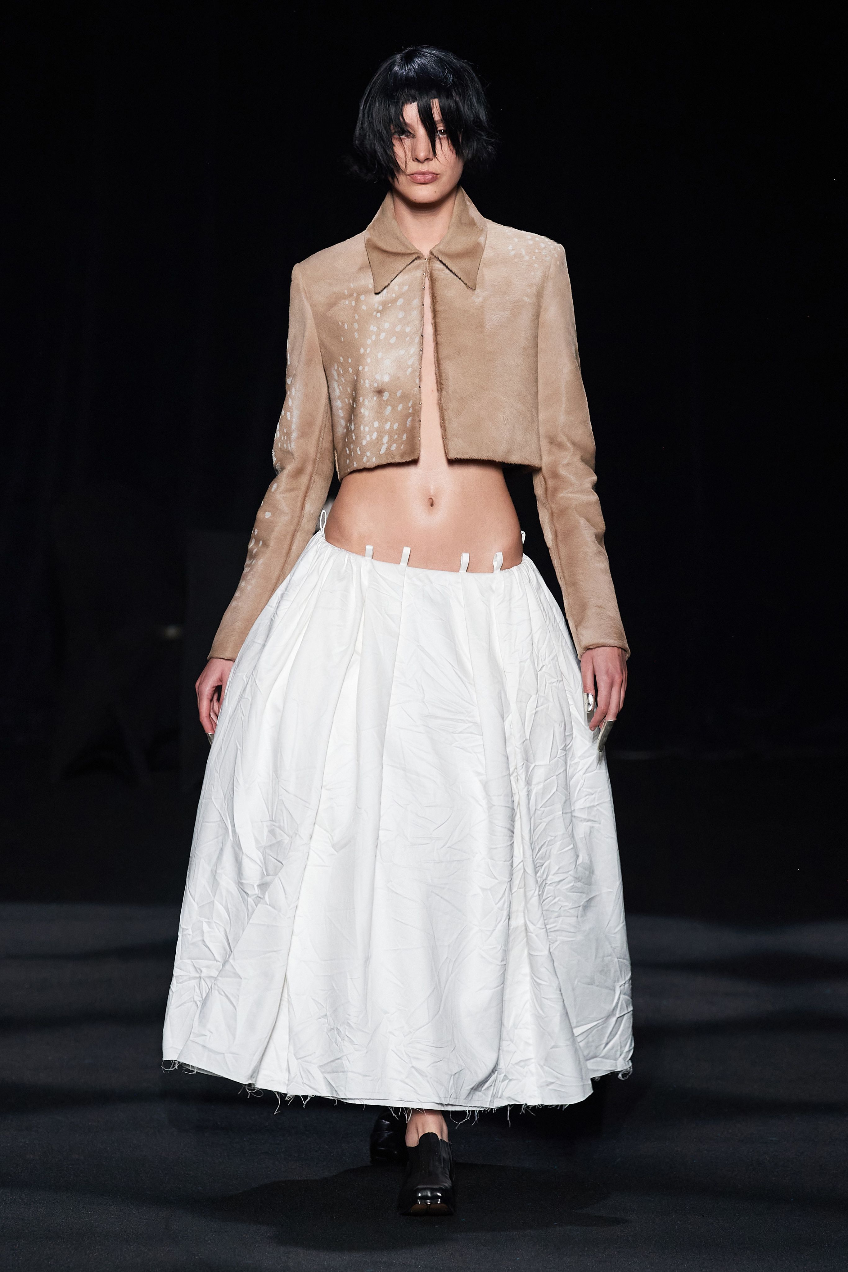 MILAN, ITALY - SEPTEMBER 22, 2018: Woman with Louis Vuitton skirt