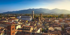 lucca panoramic aerial view of city and san martino cathedral at sunset tuscany, italy, europe