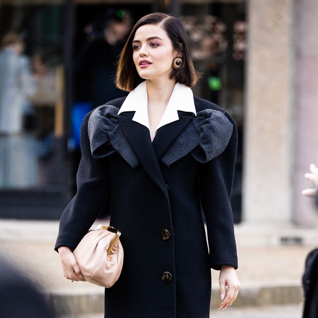 https://hips.hearstapps.com/hmg-prod/images/lucy-hale-wearing-a-black-decorated-coat-pink-bag-and-white-news-photo-1666275687.jpg?crop=0.849xw:0.566xh;0.0785xw,0.0310xh&resize=640:*