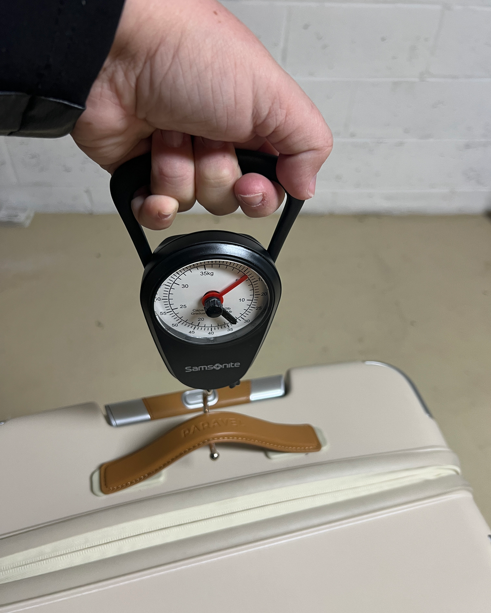 digital luggage scale with suitcase for weight measurement