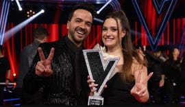 a man and woman posing for a picture