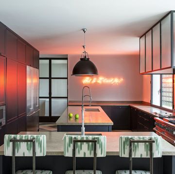 kitchen designed by luisa olazabal studio features a neon work by tracey emin