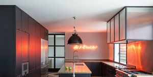 kitchen designed by luisa olazabal studio features a neon work by tracey emin