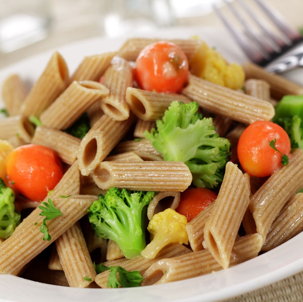 Lunch consisting of whole wheat pasta and vegetables