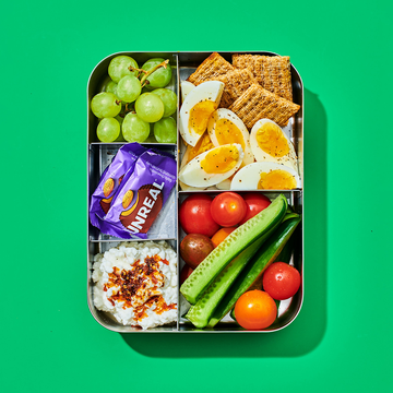homemade lunchable on a green background