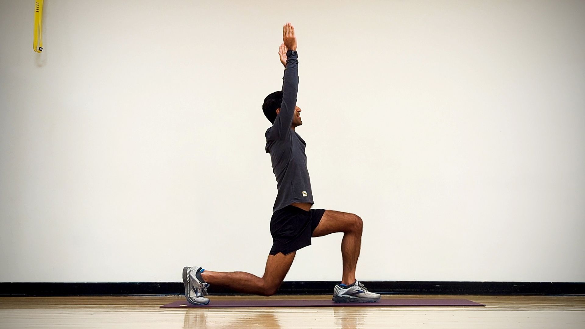 Woman stretching arms for good flexibility of her bicep stock