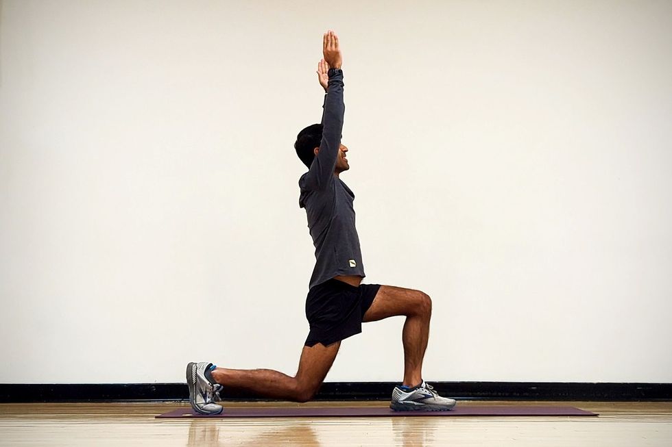 hathiramani practices lunge with overhead reach exercise