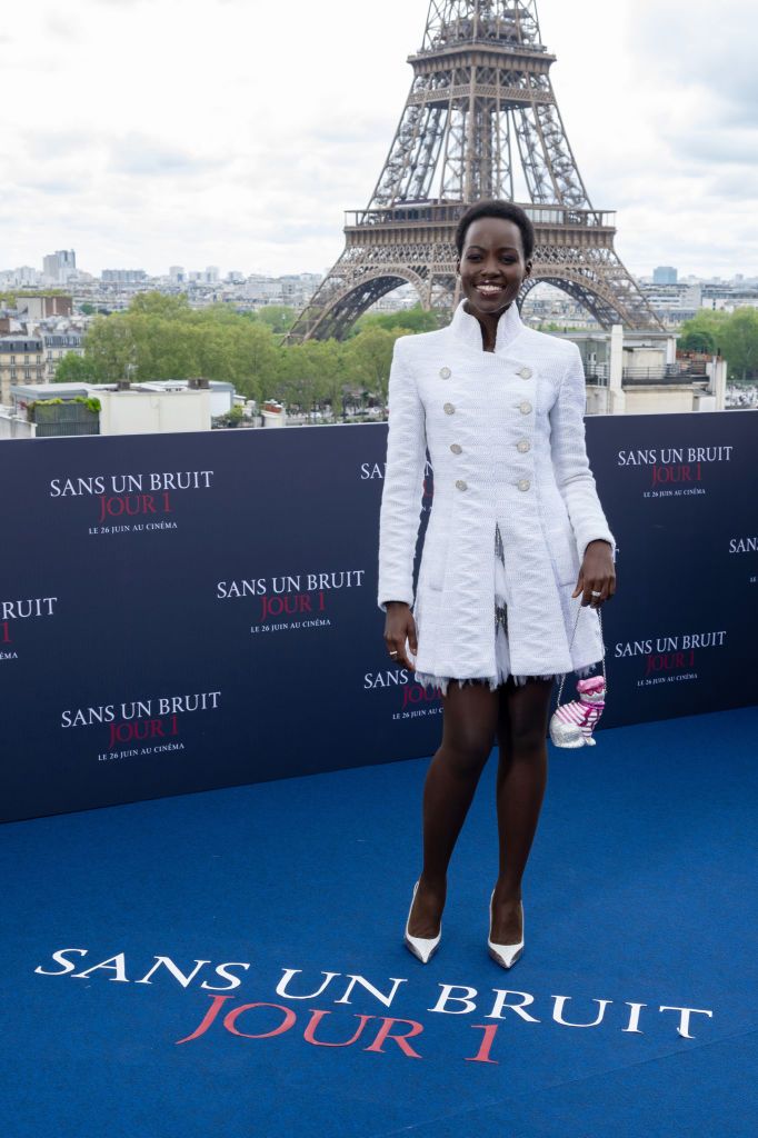 lupita nyongo wears chanel suit to the premiere of a quiet place day one
