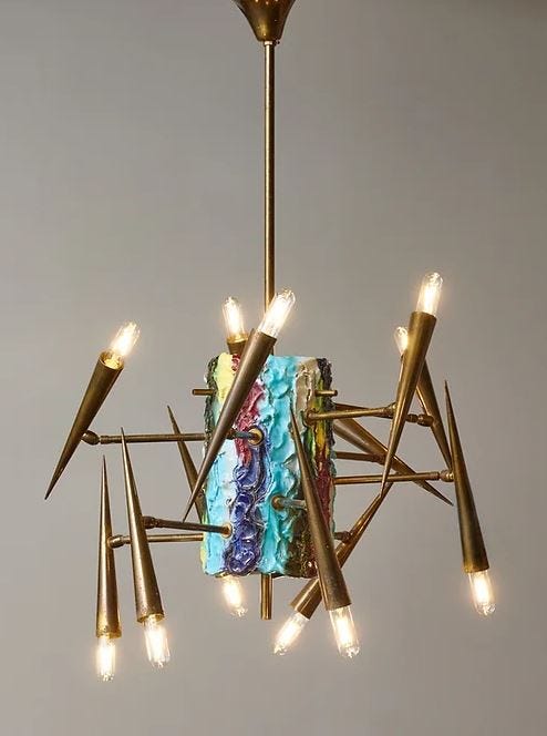chandelier with a colorful centerpiece and spiked arms chandelier with a colorful centerpiece and spiked arms