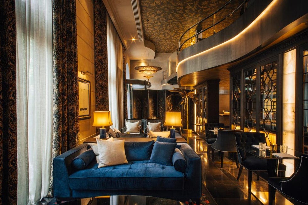 lobby lounge area with blue sofas