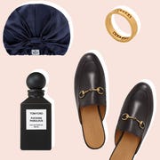 This is an image luggage, silk hair wrap, gold band, epara serum, watch, roses, master and dynamic earbuds, loafers, tom ford perfume
