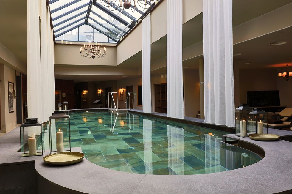luxury swimming pool in a spa with skylight