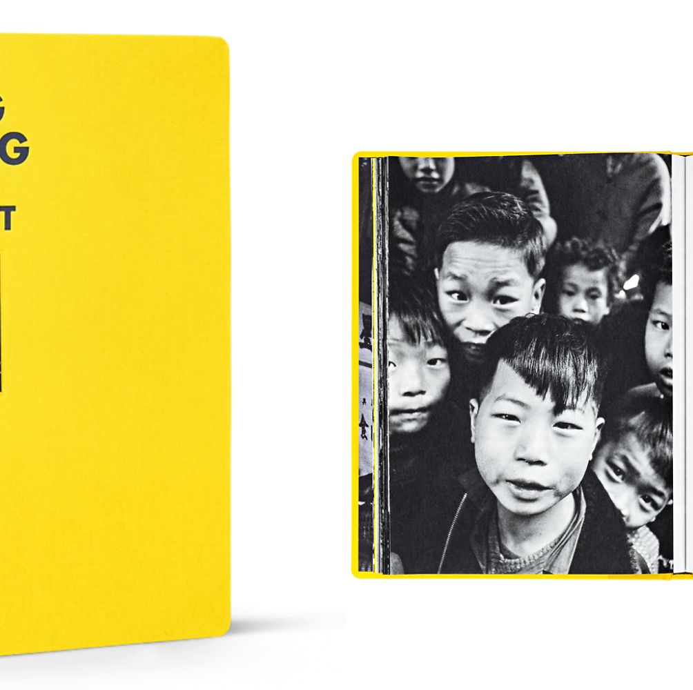 a yellow book with a picture of a group of men
