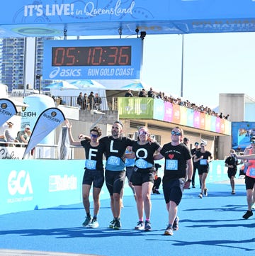 runners cross the finish line of the gold coast marathon runners cross the finish line of the gold coast marathon