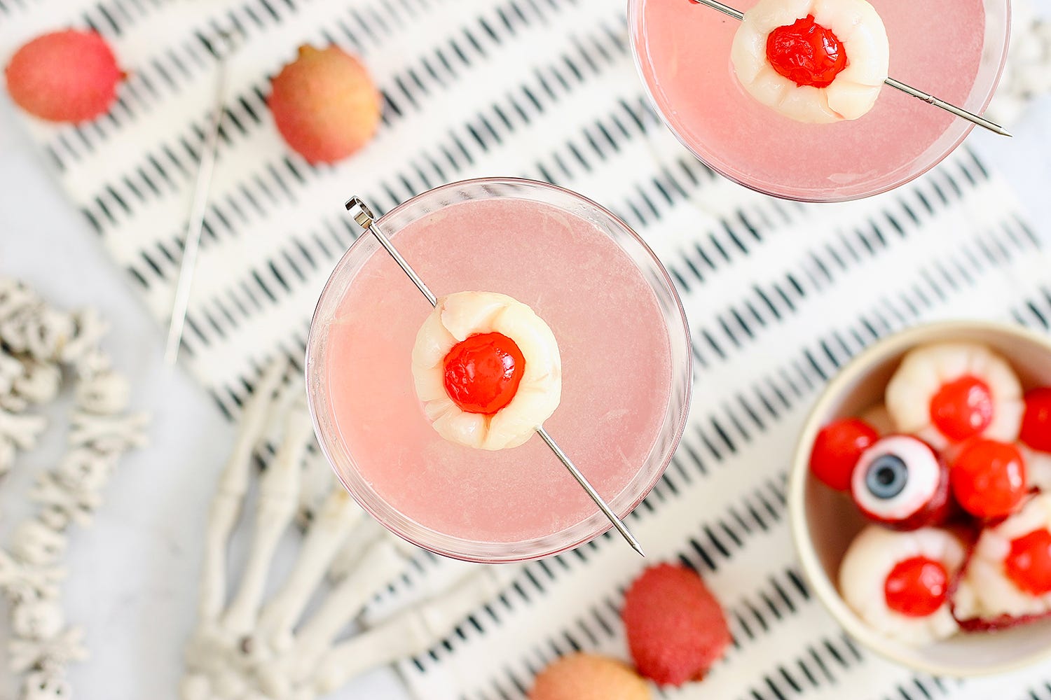 https://hips.hearstapps.com/hmg-prod/images/lychee-martini-halloween-cocktail-1661177574.jpg?crop=1.00xw:0.845xh;0,0.110xh