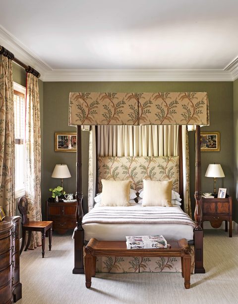 in a guest room, an acanthus vine fabric by jane shelton dresses a 20th century four poster bed the tables are from the george iii period wall upholstery fabric, cowtan tout