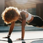 young fit woman doing pushups