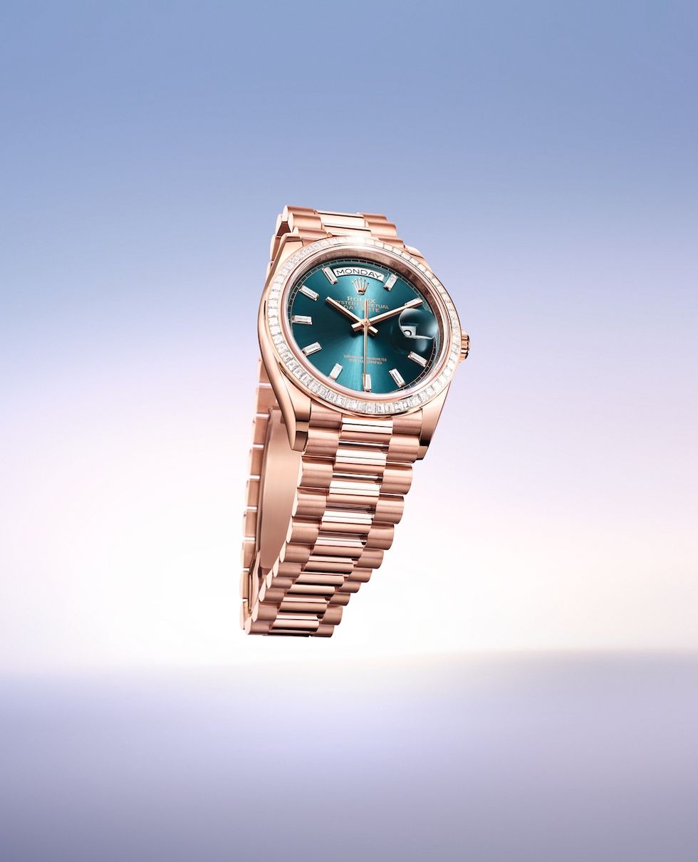 the 36mm day date in everose gold with a blue green dial