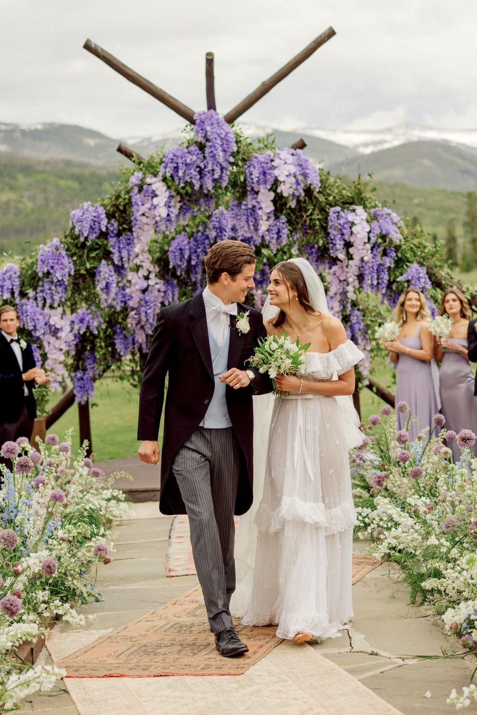 a man and woman in wedding attire