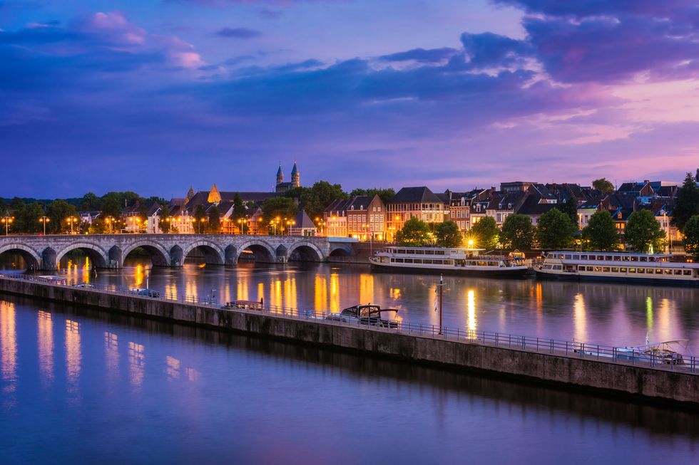 maastricht and maas river around sunset