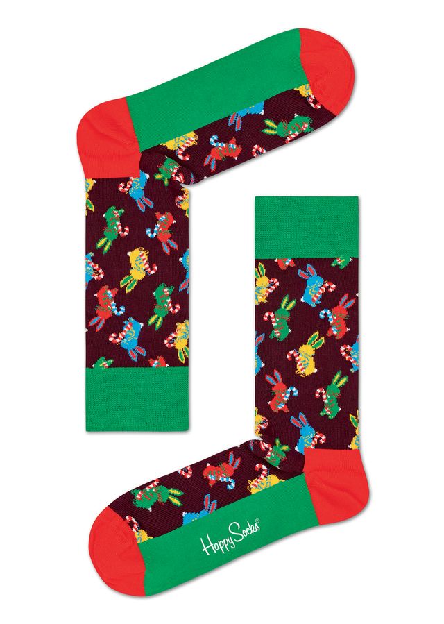 I calzini natalizi per festeggiare il 25 dicembre sono di Macaulay Culkin, indimenticabile Kevin di Mamma ho perso l'aereo: calze Happy Socks Naughty or Nice.