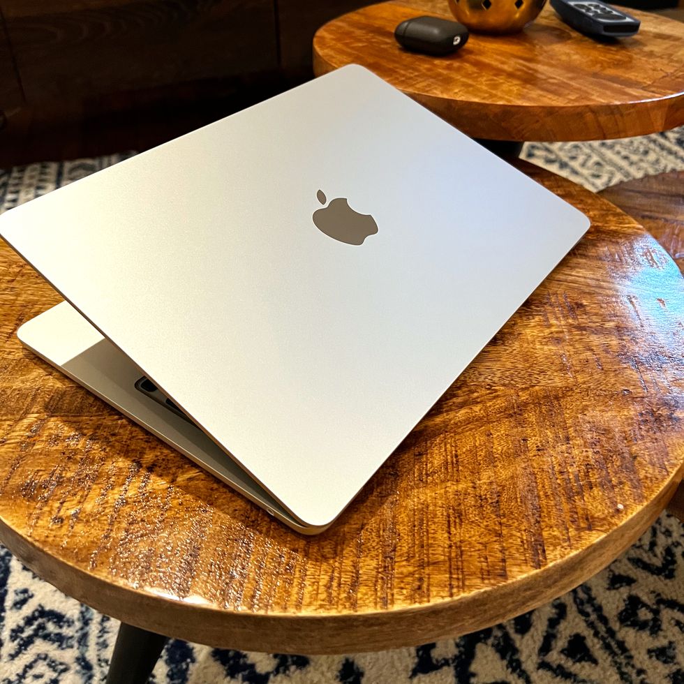 macbook air with m2 chip on coffee table