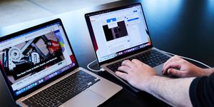 two macbooks being tested