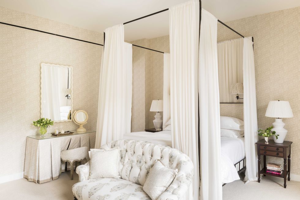 white bedroom, white linen, white curtains, black bed frame,