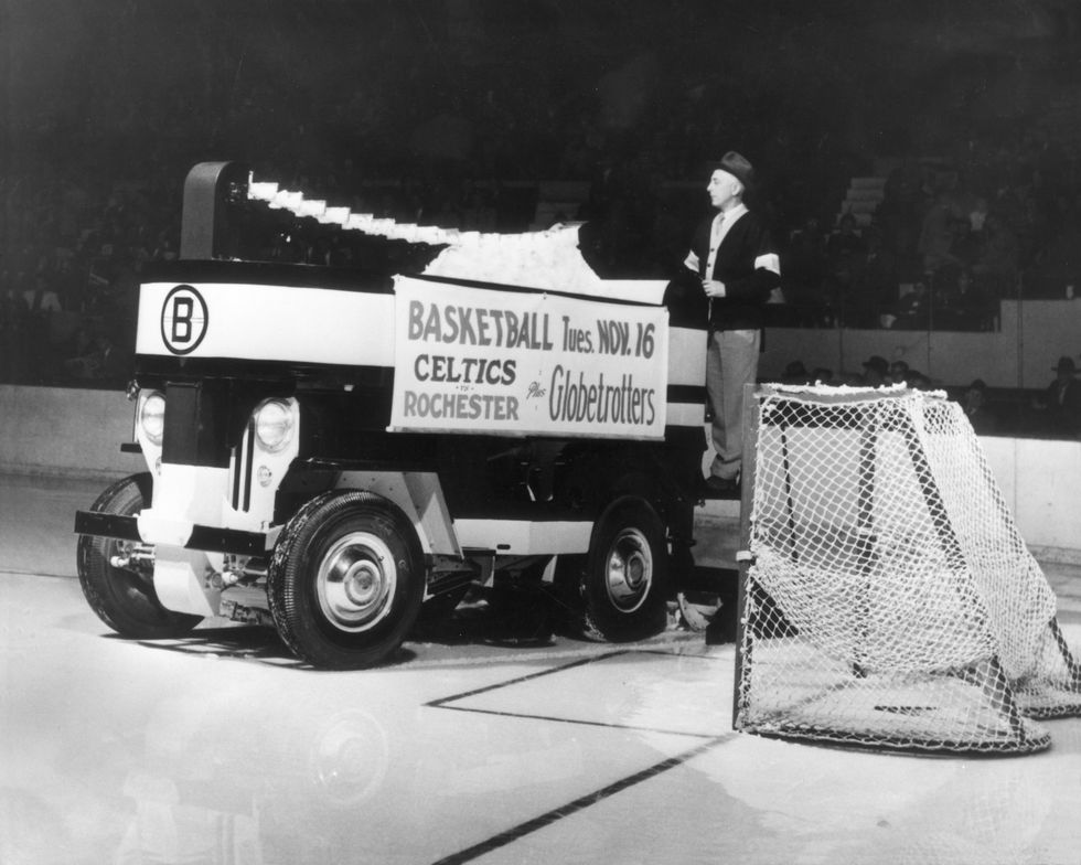 another photograph showing lelo driving the machine on another occasion  this machine was later restored by zamboni for the boston garden arena and was then donated to the nhl hall of fame in toronto