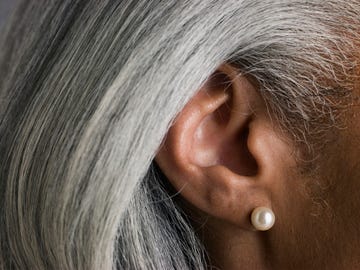 macro shot of senior woman's ear