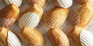 french madeleines, some dipped in white chocolate and some with a dusting of powdered sugar