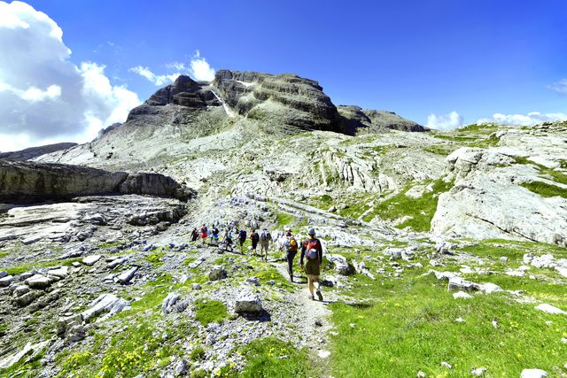 madonna di campiglio, hikers at the groste mountain pass.