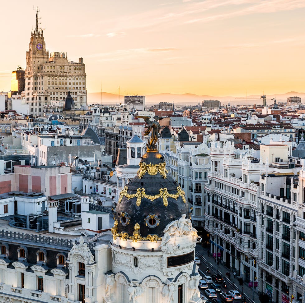 view of metropolis building from círculo de bellas artes, madrid, spain