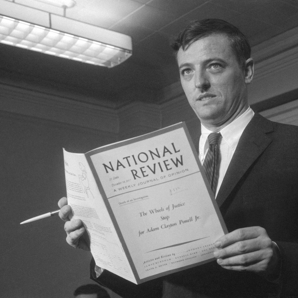 william f. buckley holding book
