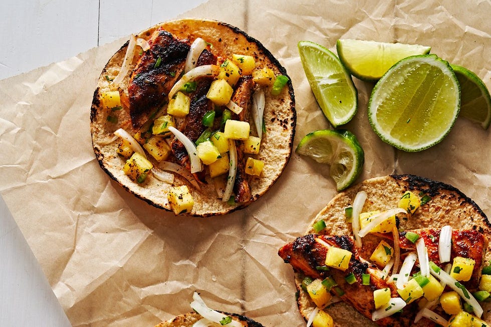 mahi mahi tacos with white sliced onions