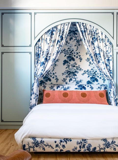 contemporary bedroom with blue toile uphosletry