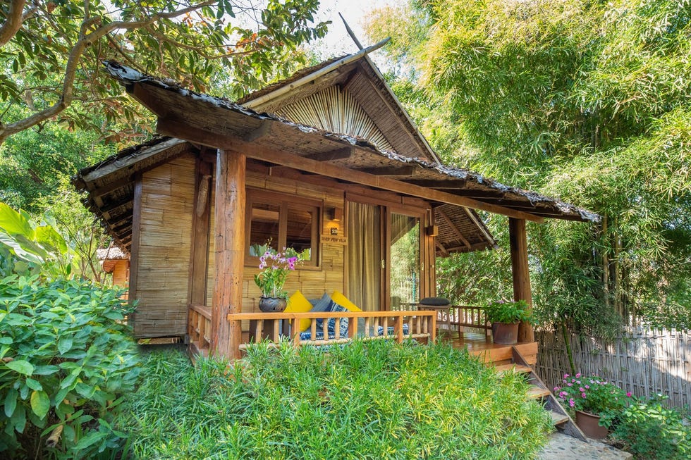 wooden river view villa surrounded by greenery wooden river view villa surrounded by greenery