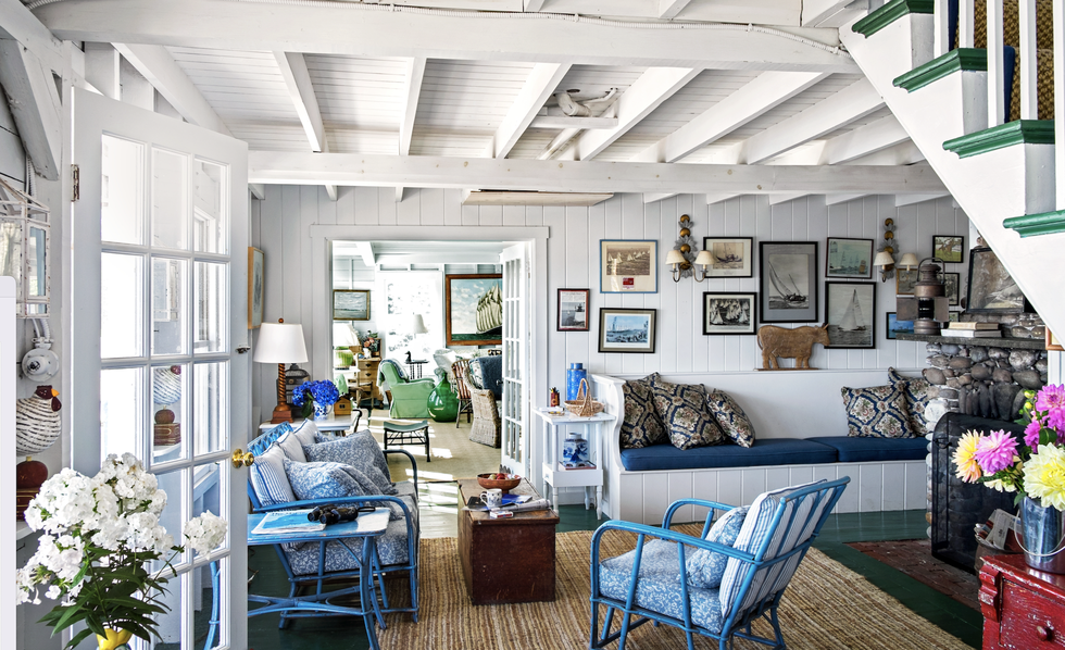 a maine living room with a collected gallery wall